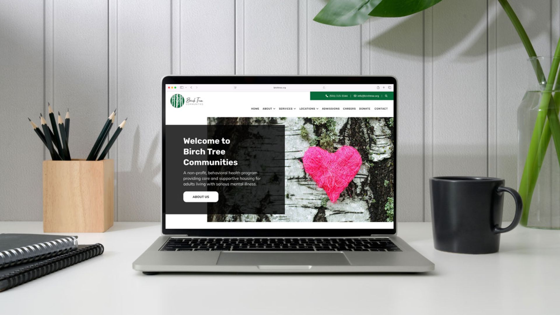 mock up of new Birch Tree Communities website on macbook
